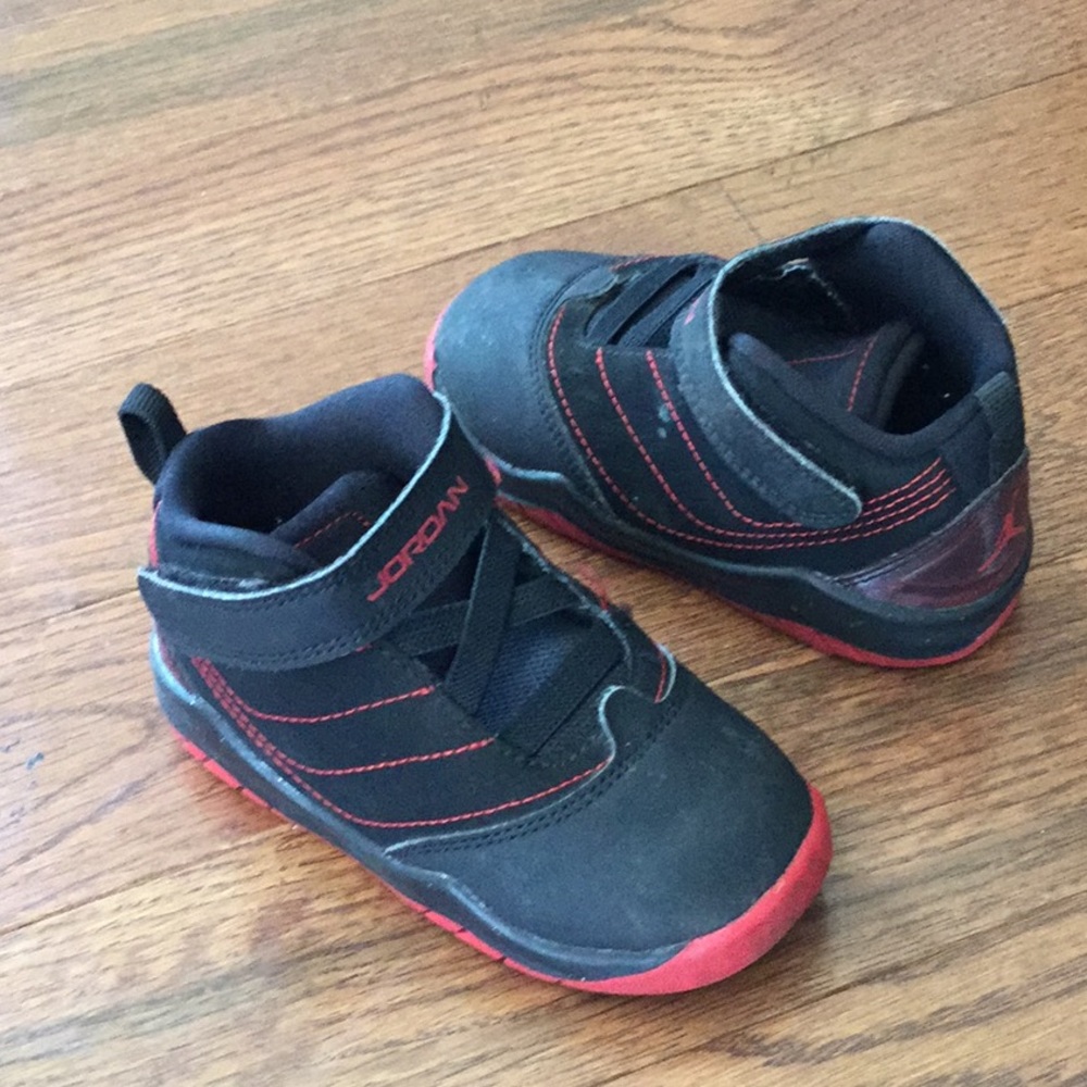 Boys back and red Jordans